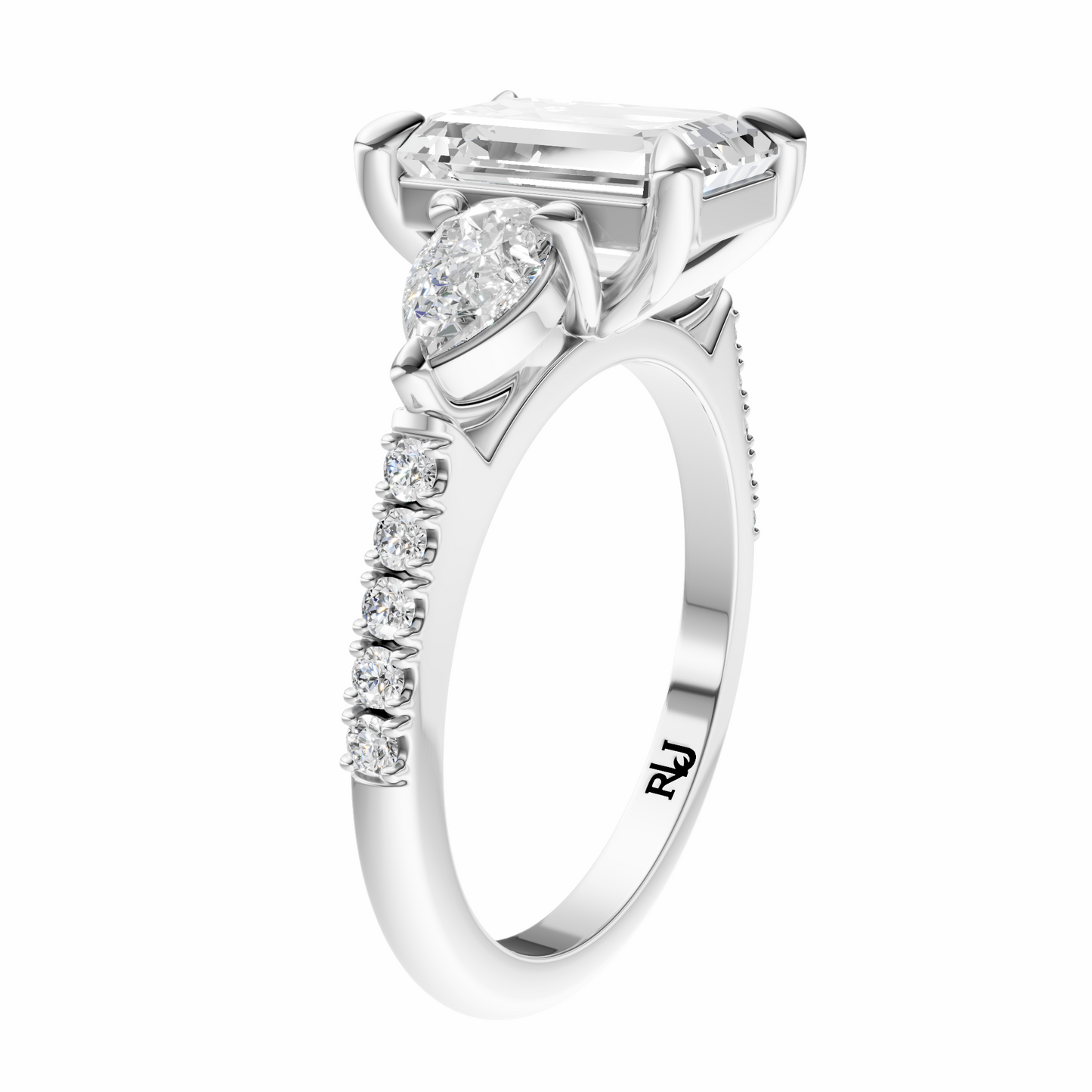 Emerald Accented Three Stone Pear Setting
