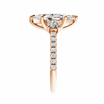 Marquise Accented Three Stone Round Setting