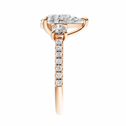 Pear Accented Three Stone Round Setting