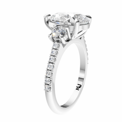 Pear Accented Three Stone Round Setting