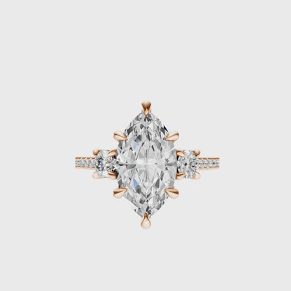 Marquise Accented Three Stone Round Setting