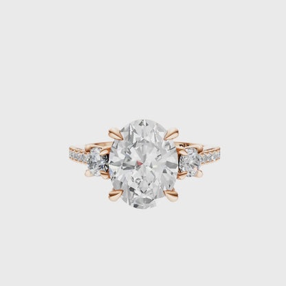 Oval Accented Three Stone Round Setting
