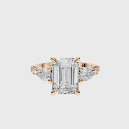 Emerald Accented Three Stone Pear Setting