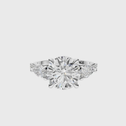 Round Accented Three Stone Pear Setting
