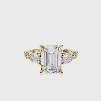 Emerald Accented Three Stone Pear Setting