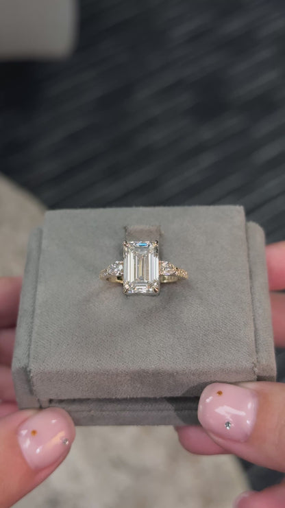 Emerald Accented Three Stone Pear Setting