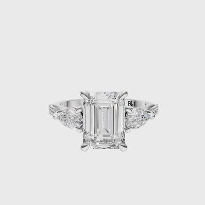 Emerald Accented Three Stone Pear Setting