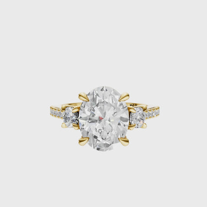 Oval Accented Three Stone Round Setting