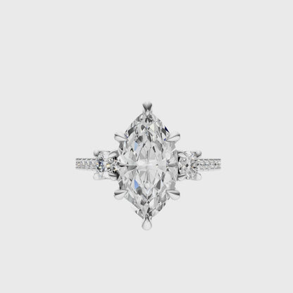 Marquise Accented Three Stone Round Setting