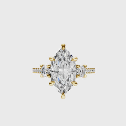 Marquise Accented Three Stone Round Setting